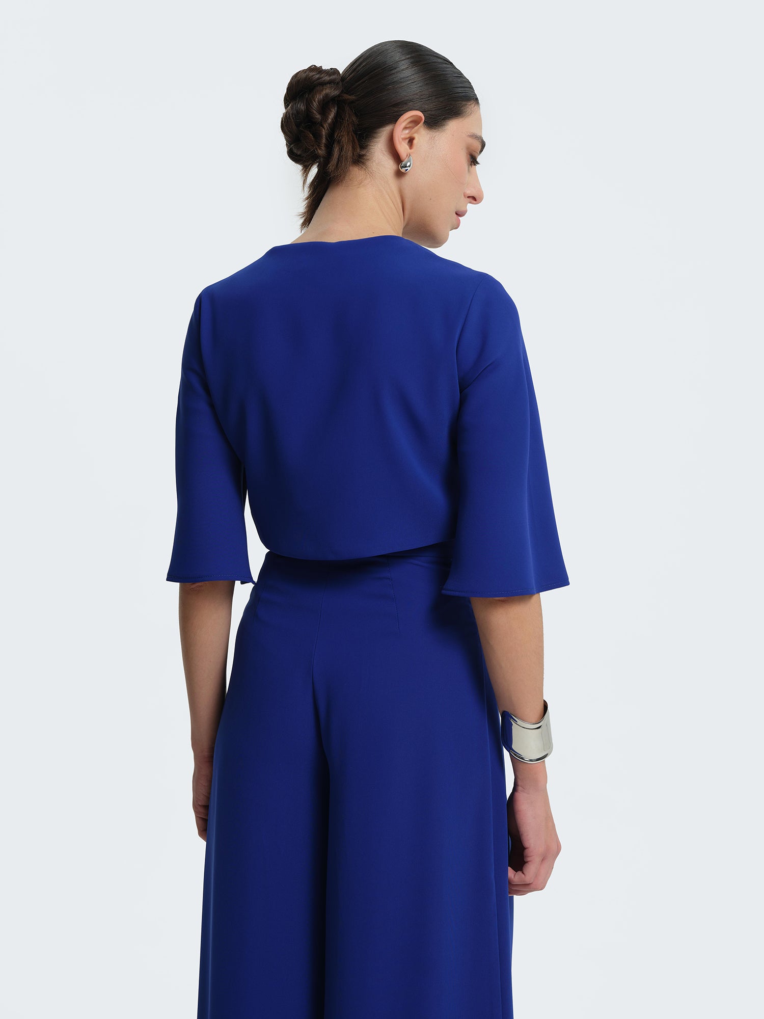 Bolero con maniche a tre quarti