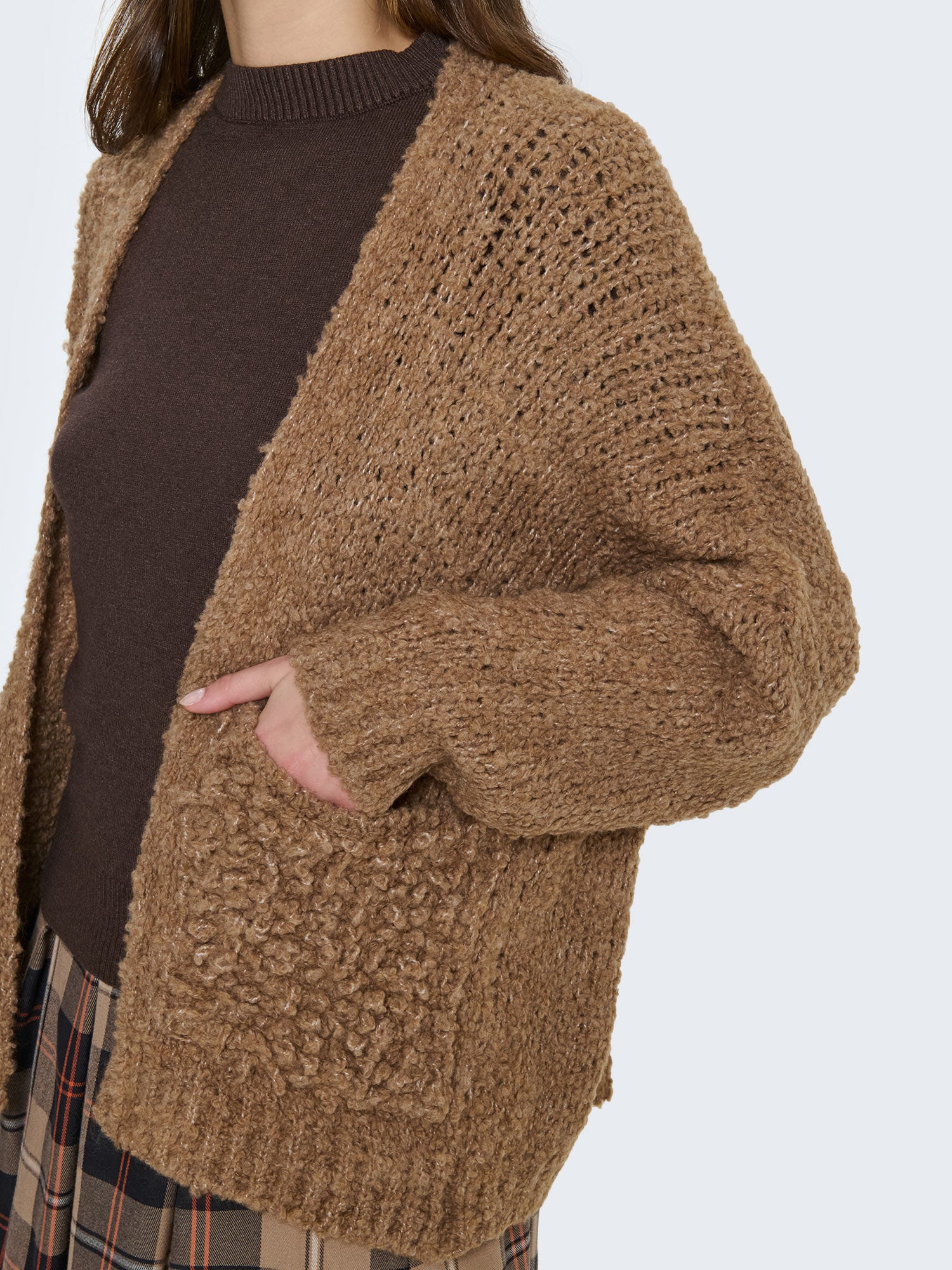 Cardigan intrecciato bouclé