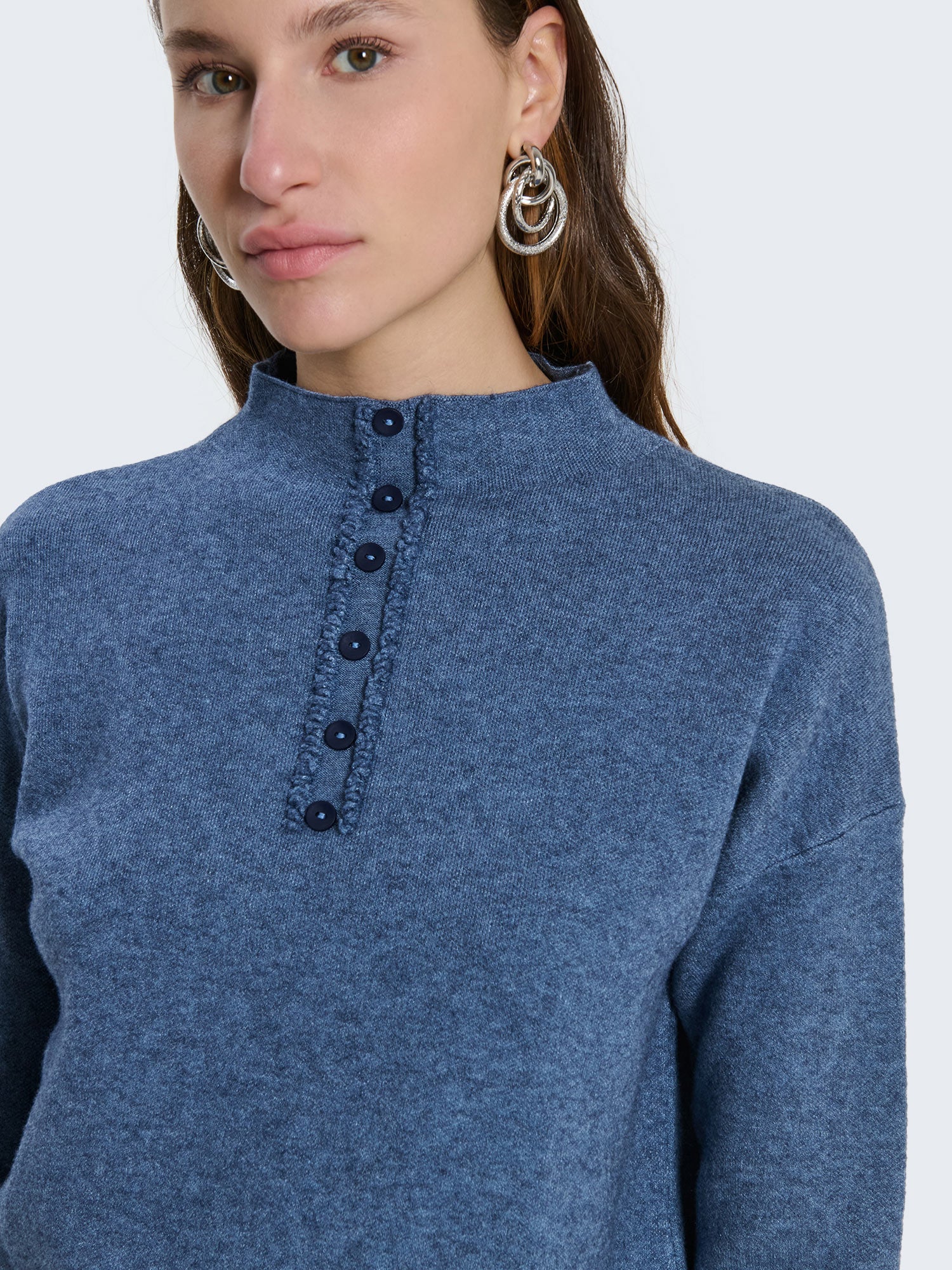 Crew neck sweater with decorative buttons