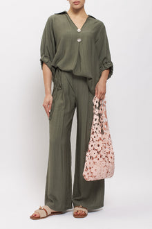Pantalone palazzo con pannello