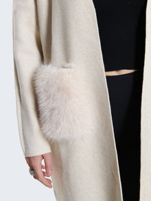 Cardigan lungo con tasche in pelliccia