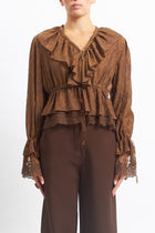 Blusa in pizzo con rouches