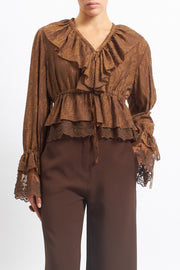 Blusa in pizzo con rouches