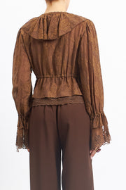Blusa in pizzo con rouches