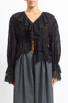 Blusa in pizzo con rouches