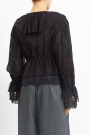 Blusa in pizzo con rouches