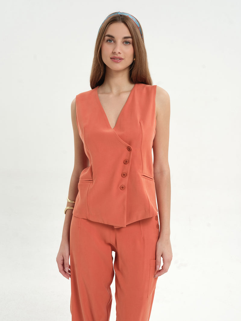 Gilet con chiusura asimmetrica