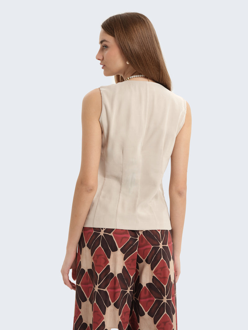Gilet con chiusura asimmetrica