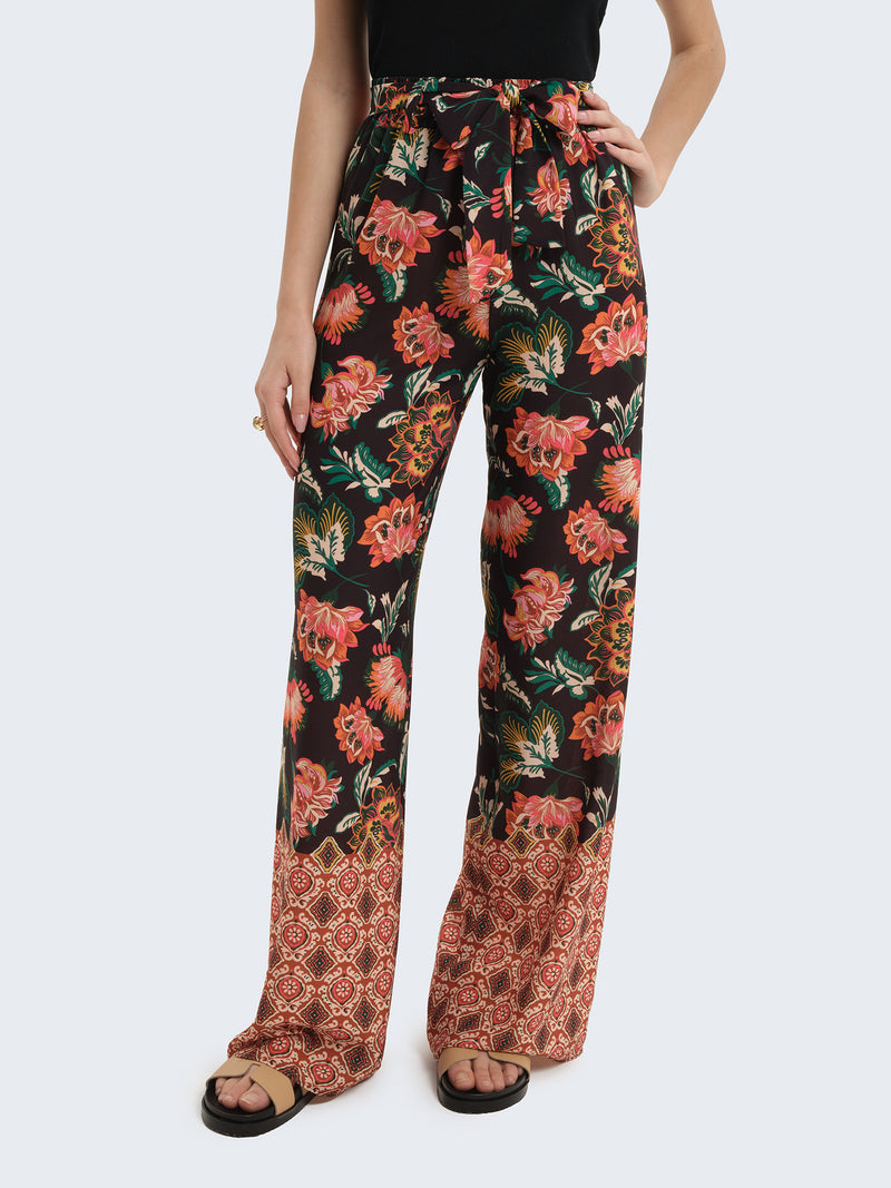 Pantaloni palazzo con fantasia floreale
