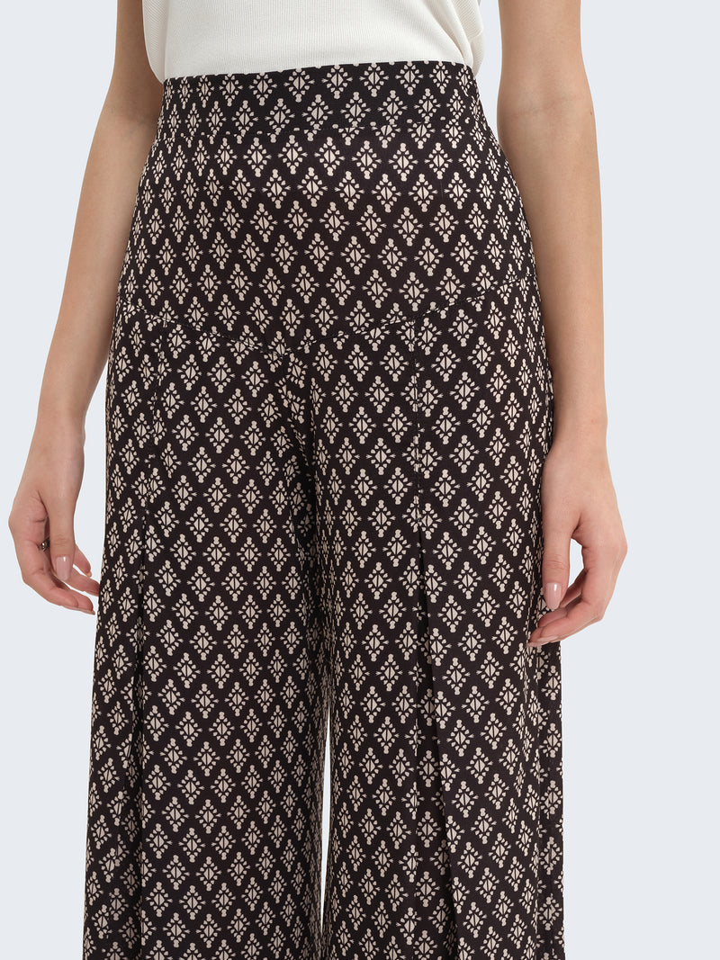 Pantaloni palazzo con fantasia geometrica