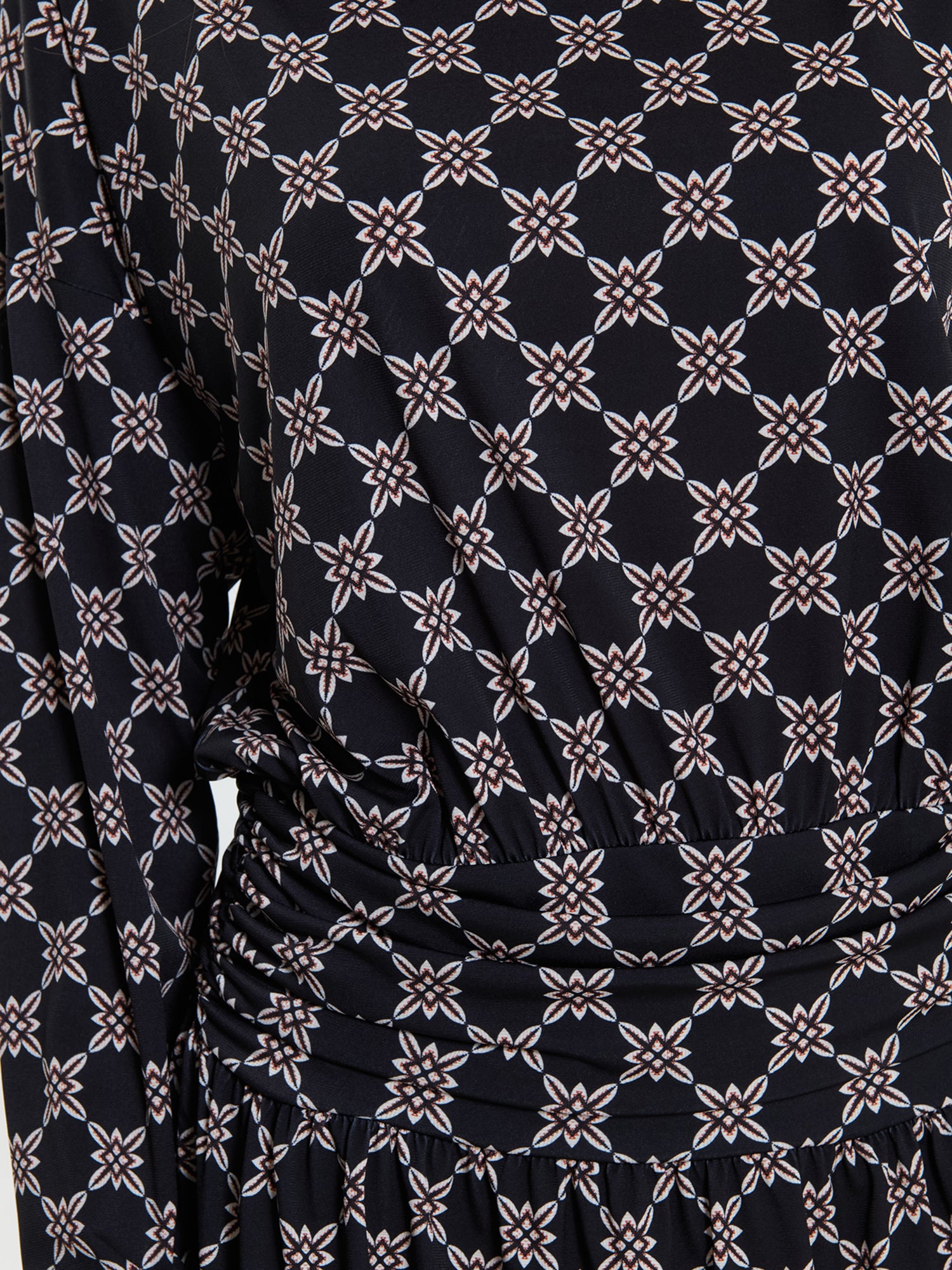 Abito corto fantasia con bottoni gioiello