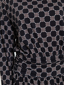 Abito corto fantasia con bottoni gioiello