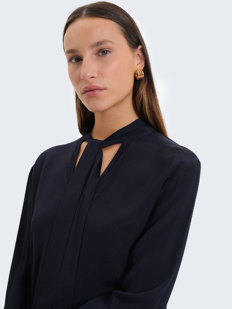 Blusa con fiocco