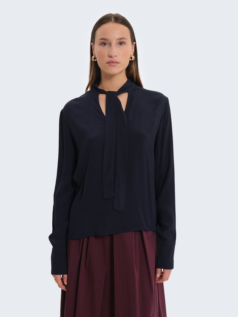 Blusa con fiocco