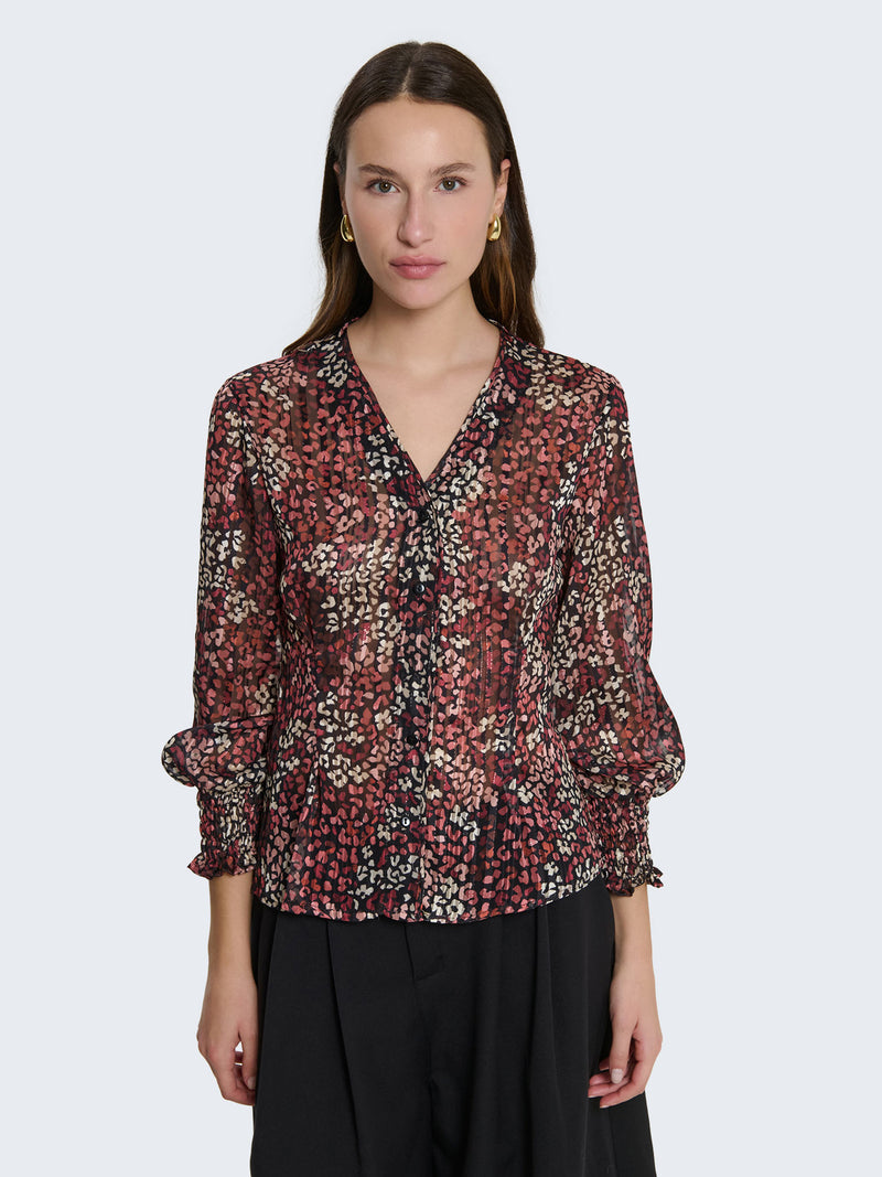 Camicia con filo lamé e maniche a palloncino