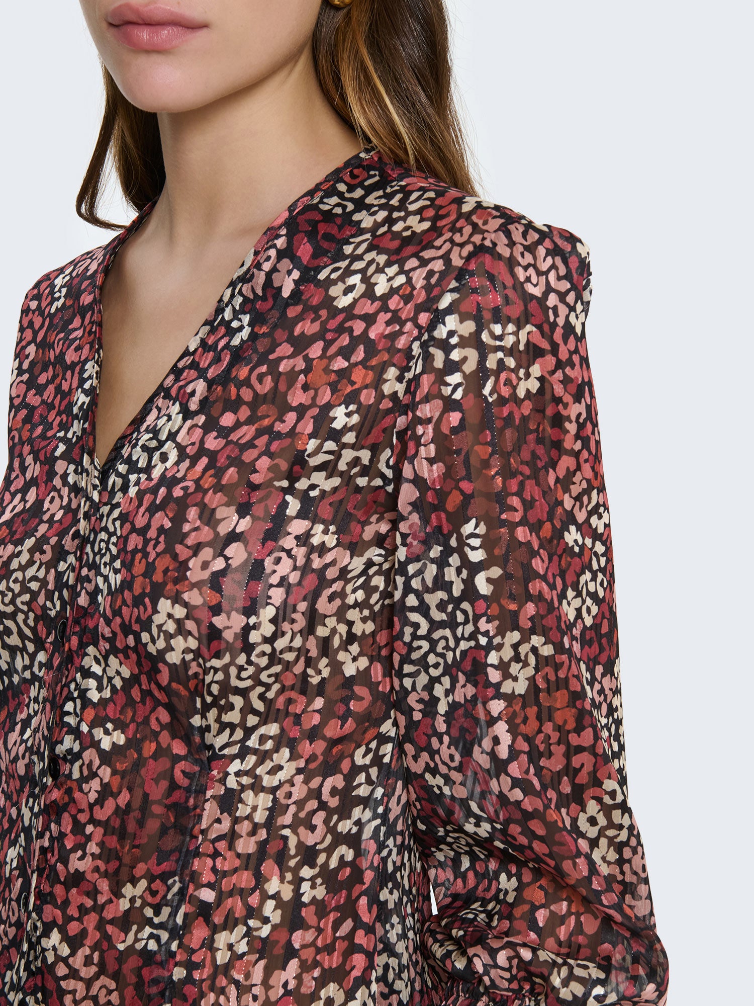 Camicia con filo lamé e maniche a palloncino
