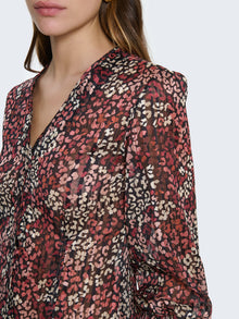 Camicia con filo lamé e maniche a palloncino