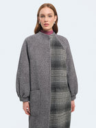 Cappotto lungo patchwork con maniche a palloncino