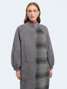 Cappotto lungo patchwork con maniche a palloncino