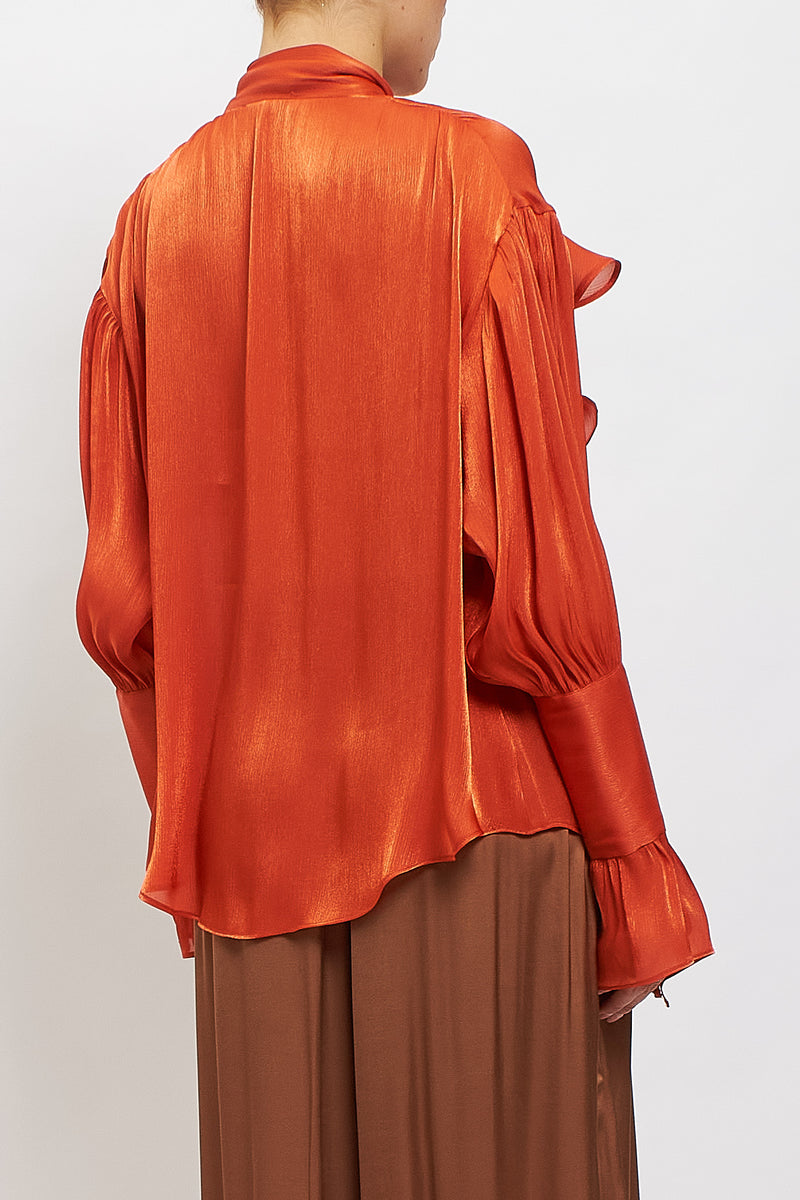 Blusa con fiocco e rouches