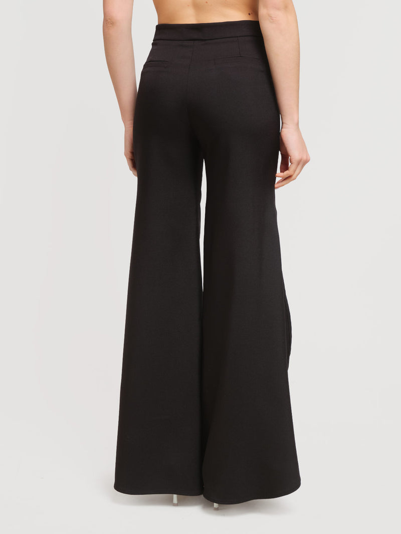 Pantalone con spacchi laterali