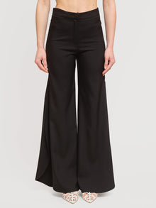 Pantalone con spacchi laterali
