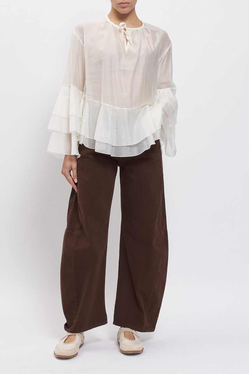 Blusa con maniche volant