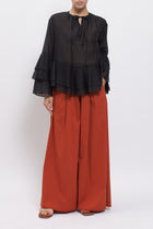 Blusa con maniche volant