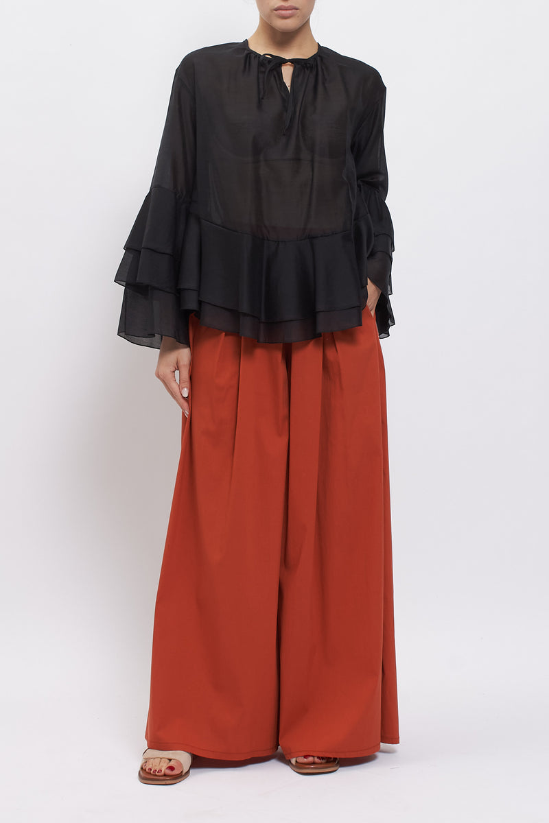 Blusa con maniche volant