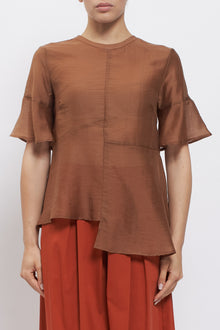 Blusa con tagli