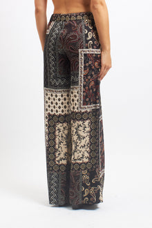 Pantalone palazzo con fantasia Patchwork