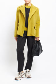 Short asymmetrical double-breasted coat