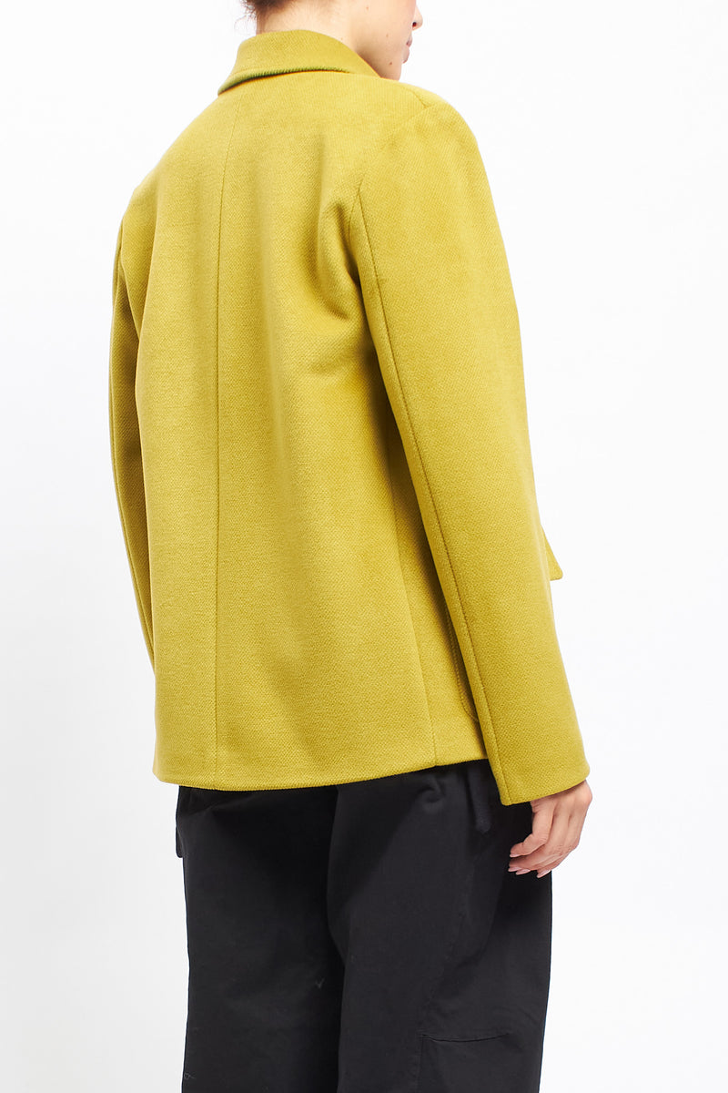 Cappotto corto asimmetrico con doppio bottone