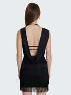 Mini abito con scollo sulla schiena e frange