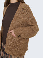 Cardigan intrecciato bouclé