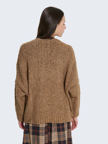 Cardigan intrecciato bouclé