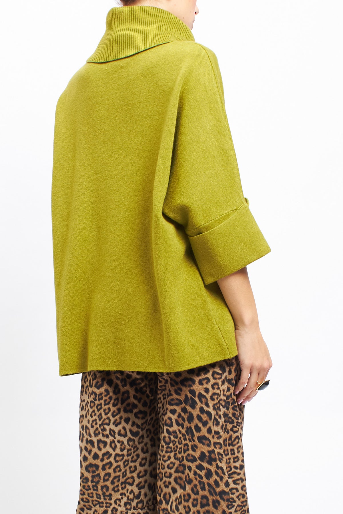 Ribbed turtleneck sweater with cuffed sleeves