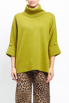 Ribbed turtleneck sweater with cuffed sleeves