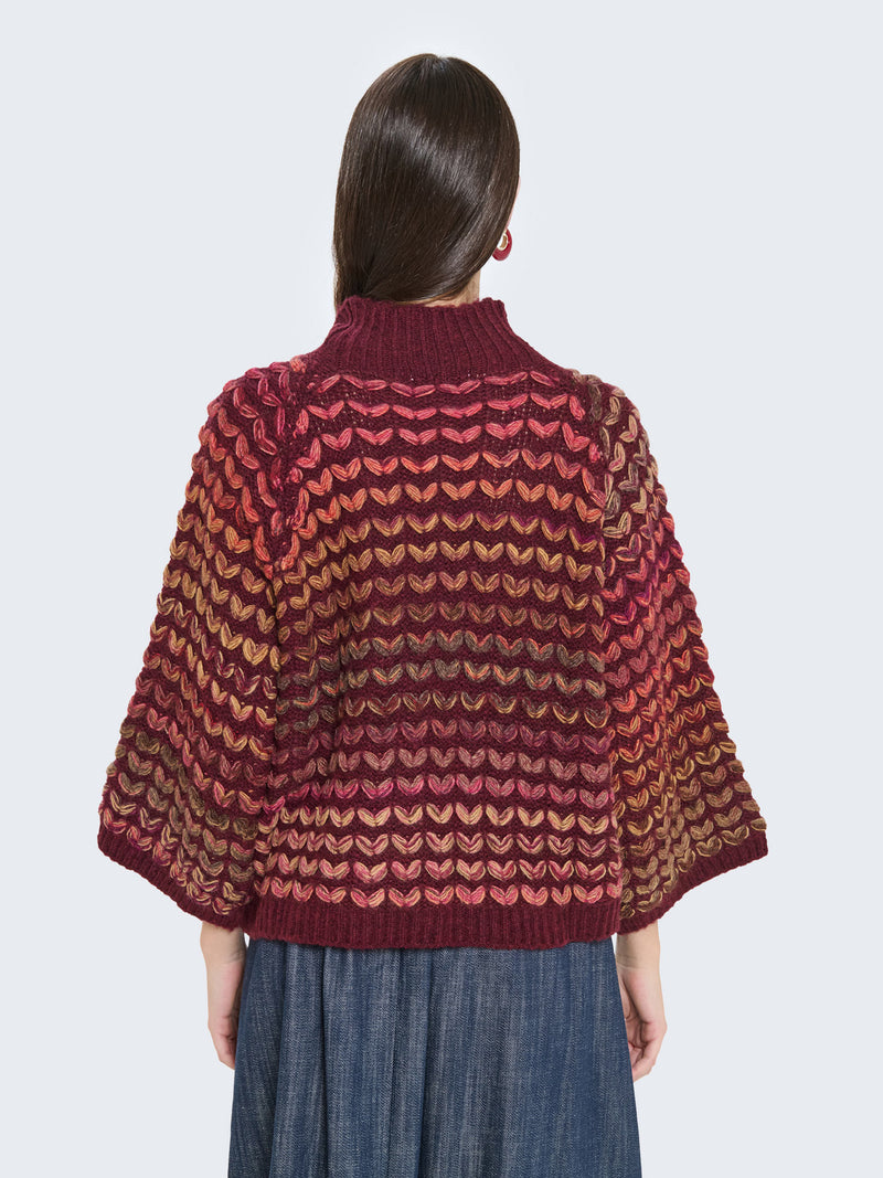 Maglione cuoricini con maniche a campana