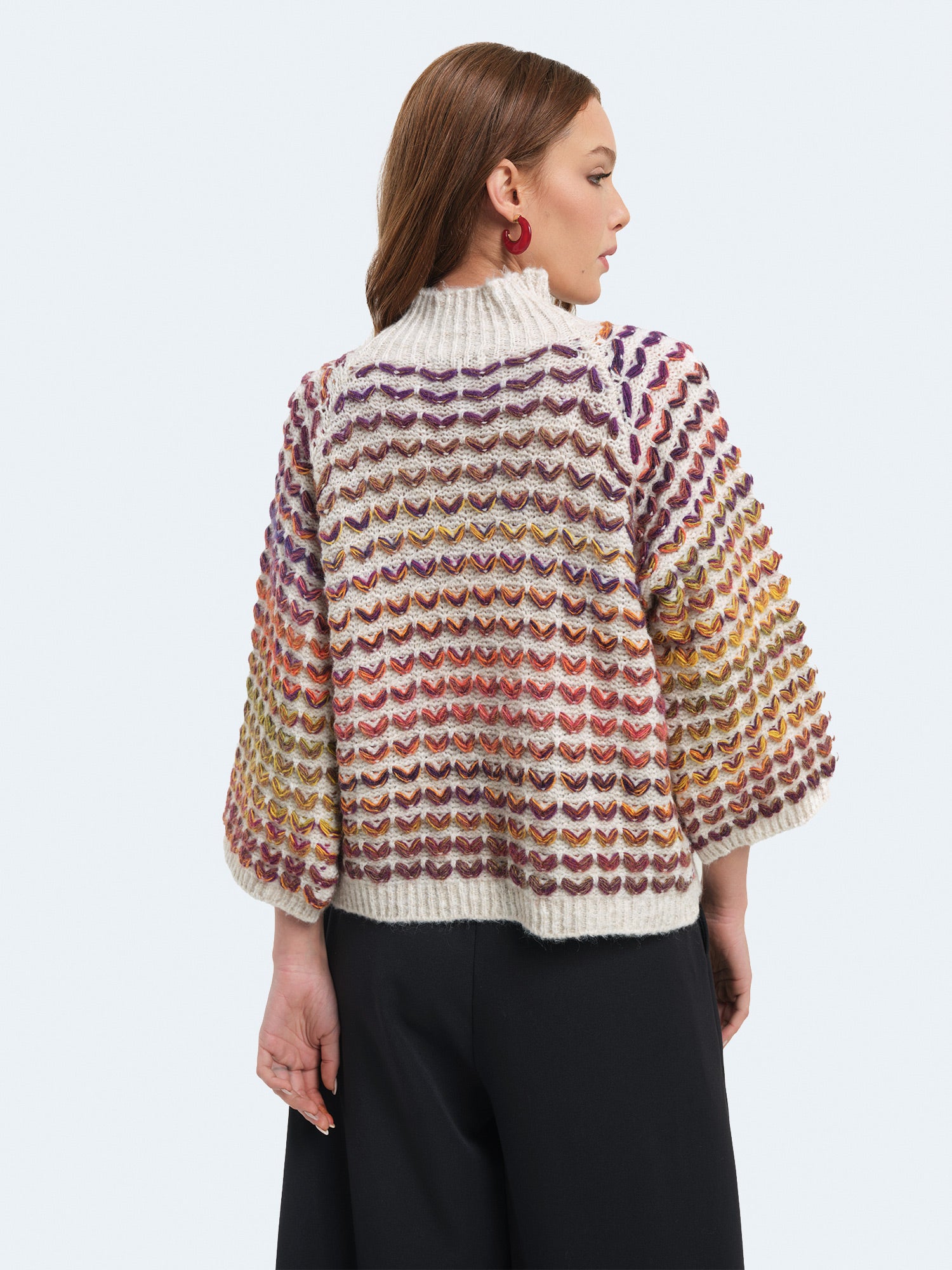 Maglione cuoricini con maniche a campana