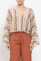 Blusa in cotone con fantasia geometrica