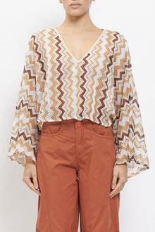 Blusa in cotone con fantasia geometrica