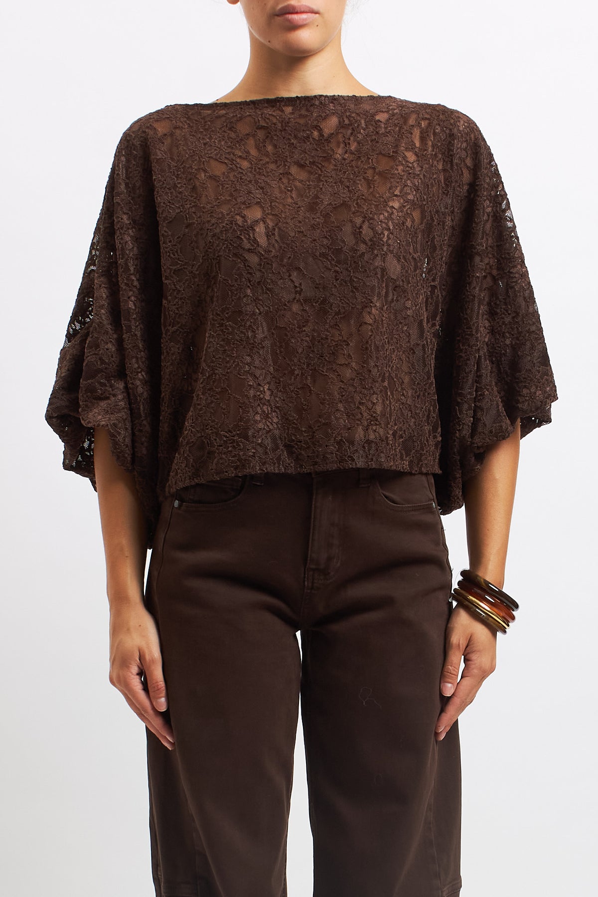Blusa in pizzo con manica a palloncino
