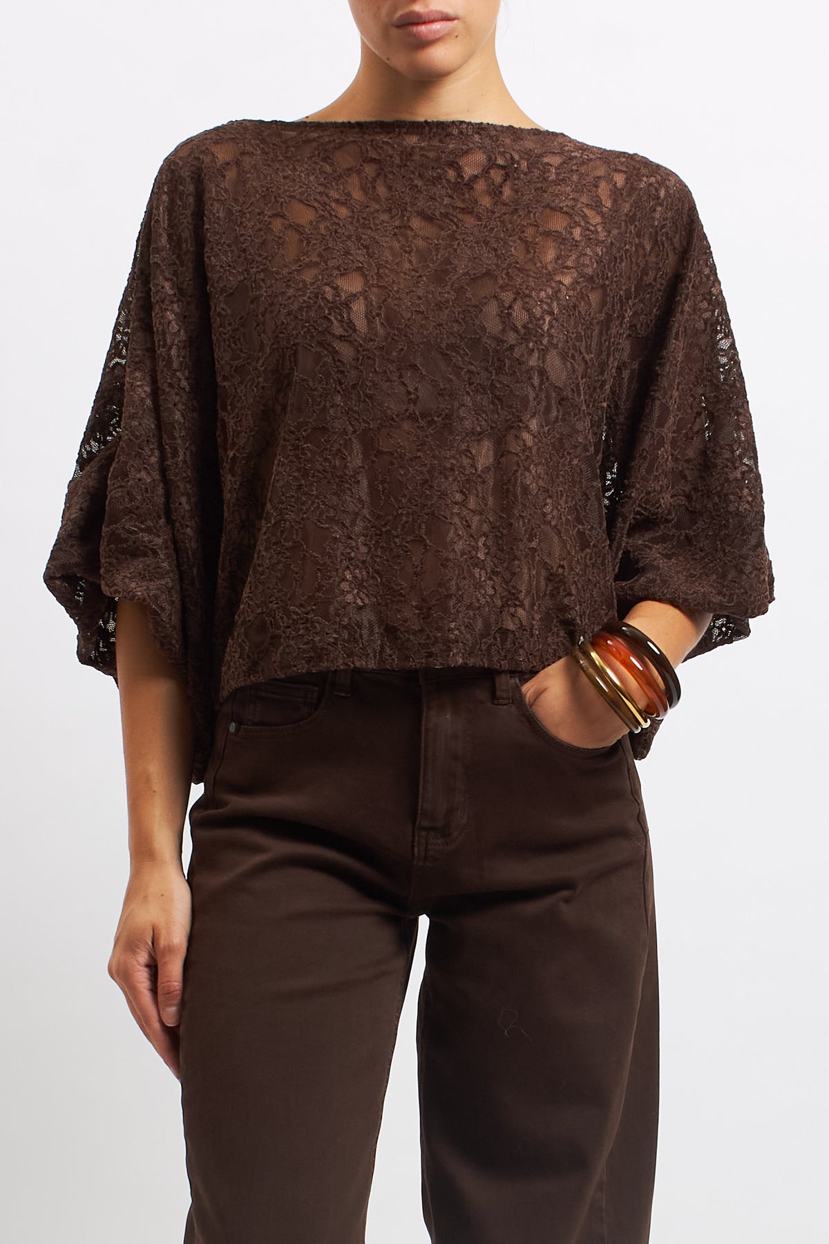 Blusa in pizzo con manica a palloncino