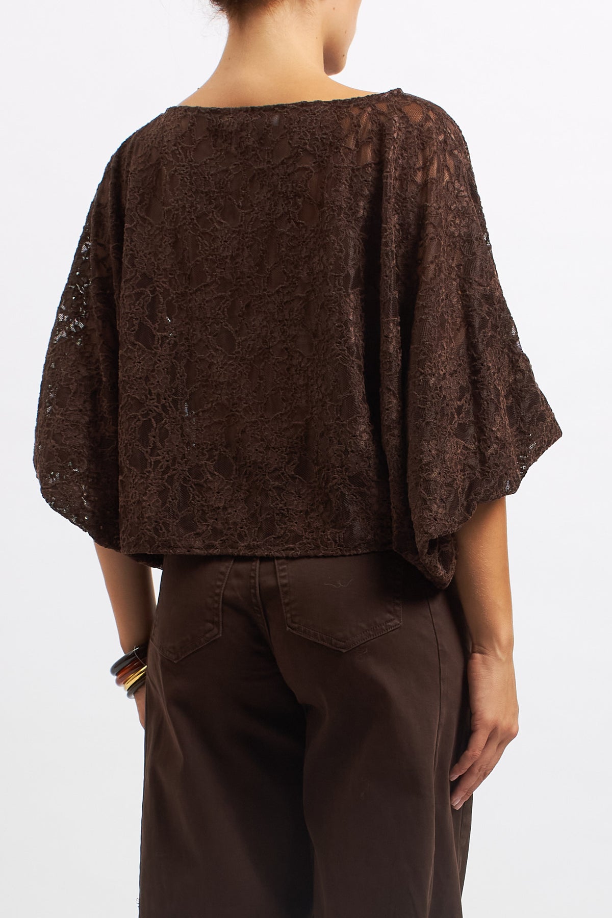 Blusa in pizzo con manica a palloncino