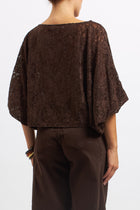 Blusa in pizzo con manica a palloncino