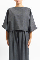 Blusa con fantasia check e manica a palloncino
