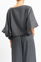 Blusa con fantasia check e manica a palloncino