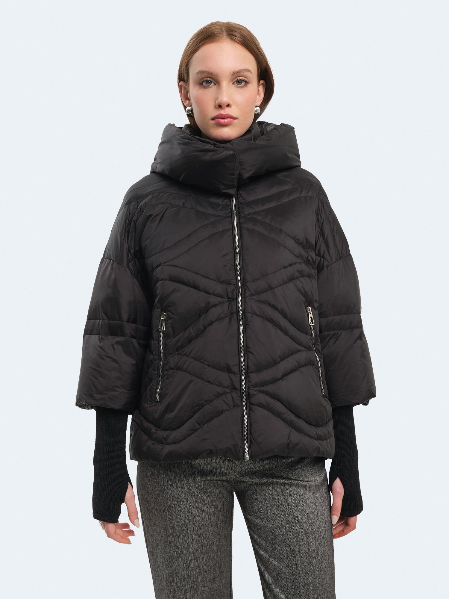 Piumino con manicotti