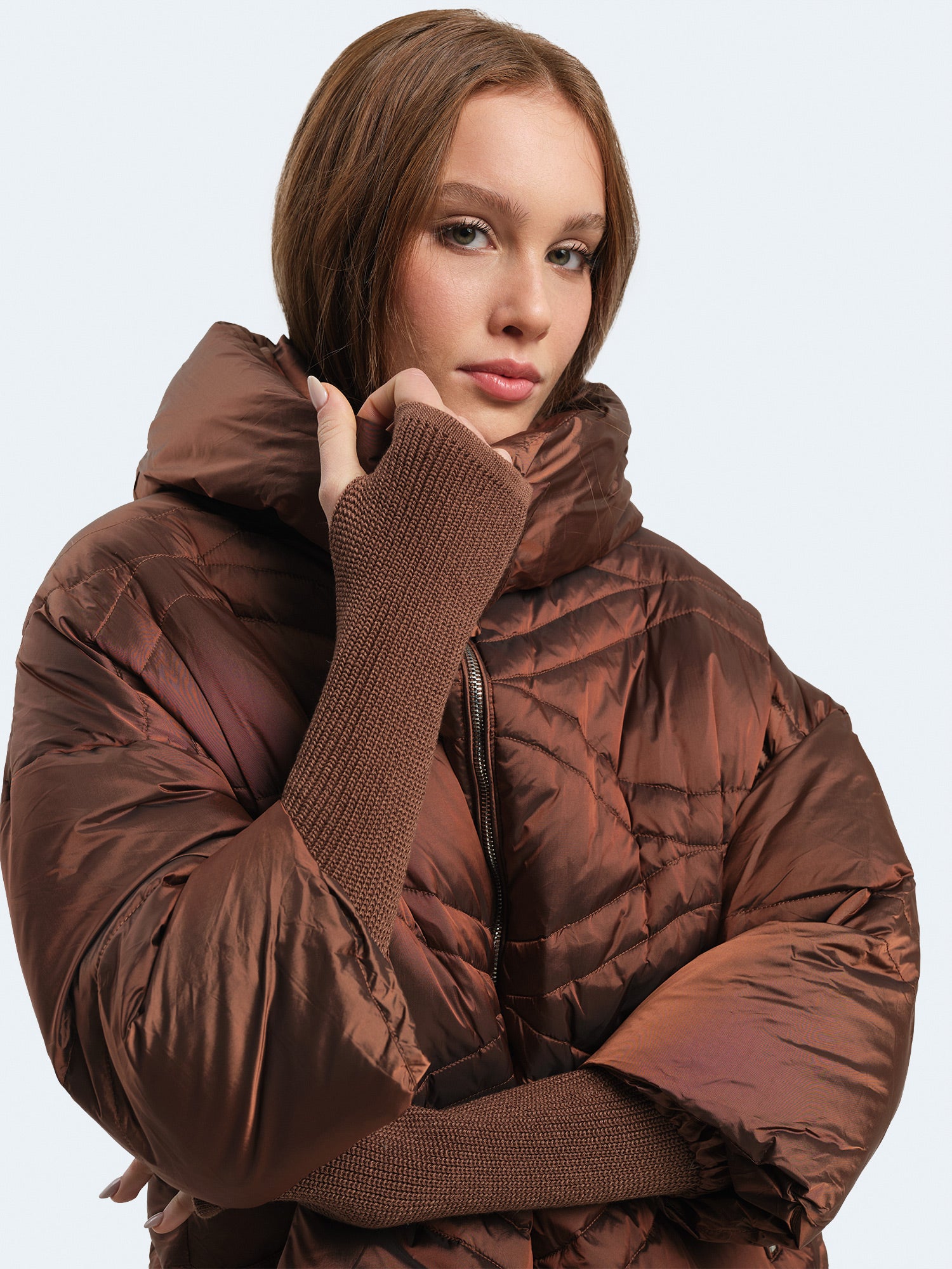 Piumino con manicotti